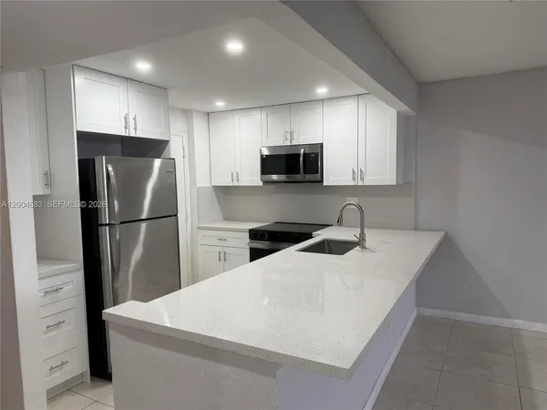 $310,000 | 9001 Southwest 77th Avenue, Unit C709, Miami, FL 33156