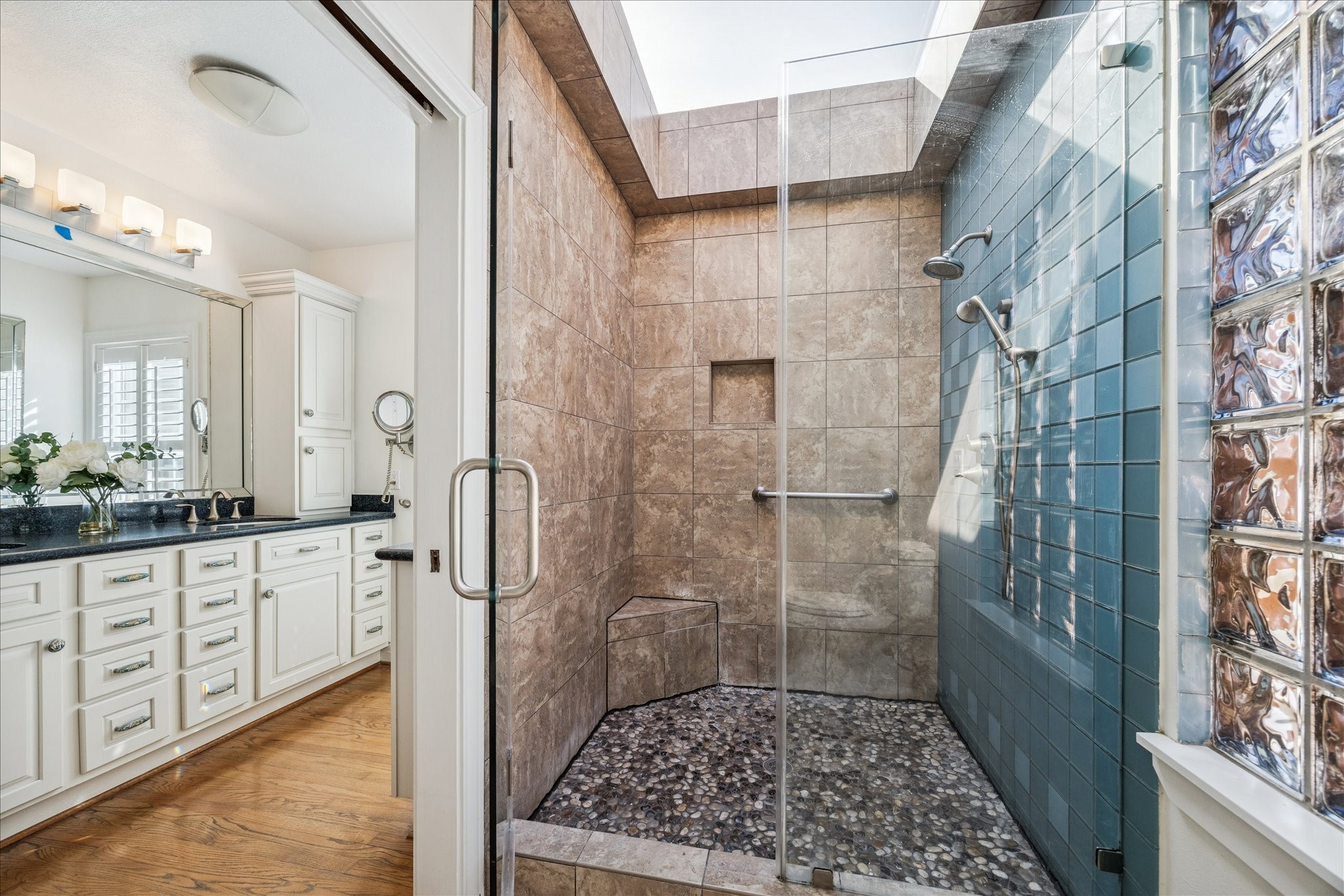 2409 Dryden Road Houston, TX 77030 - Photo 16 of 32 An oversized walk-in shower is enhanced by a skylight above, bringing in natural light and a refreshing connection to the outdoors.