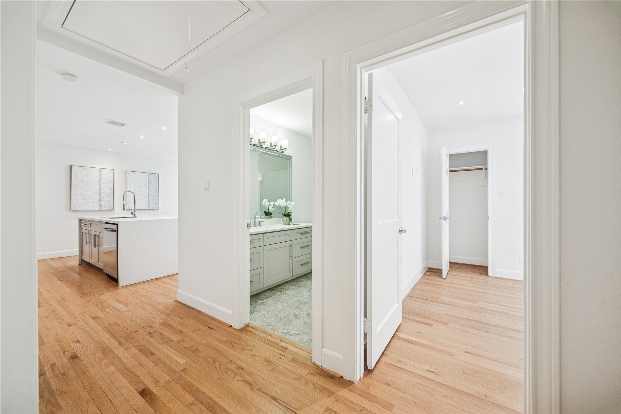 2409 Dryden Road Houston, TX 77030 - Photo 19 of 32 The upstairs quarters function as a private apartment, offering exceptional flexibility with two bedrooms, multiple living spaces, and a full kitchen. A private laundry closet located near the entry adds everyday convenience.