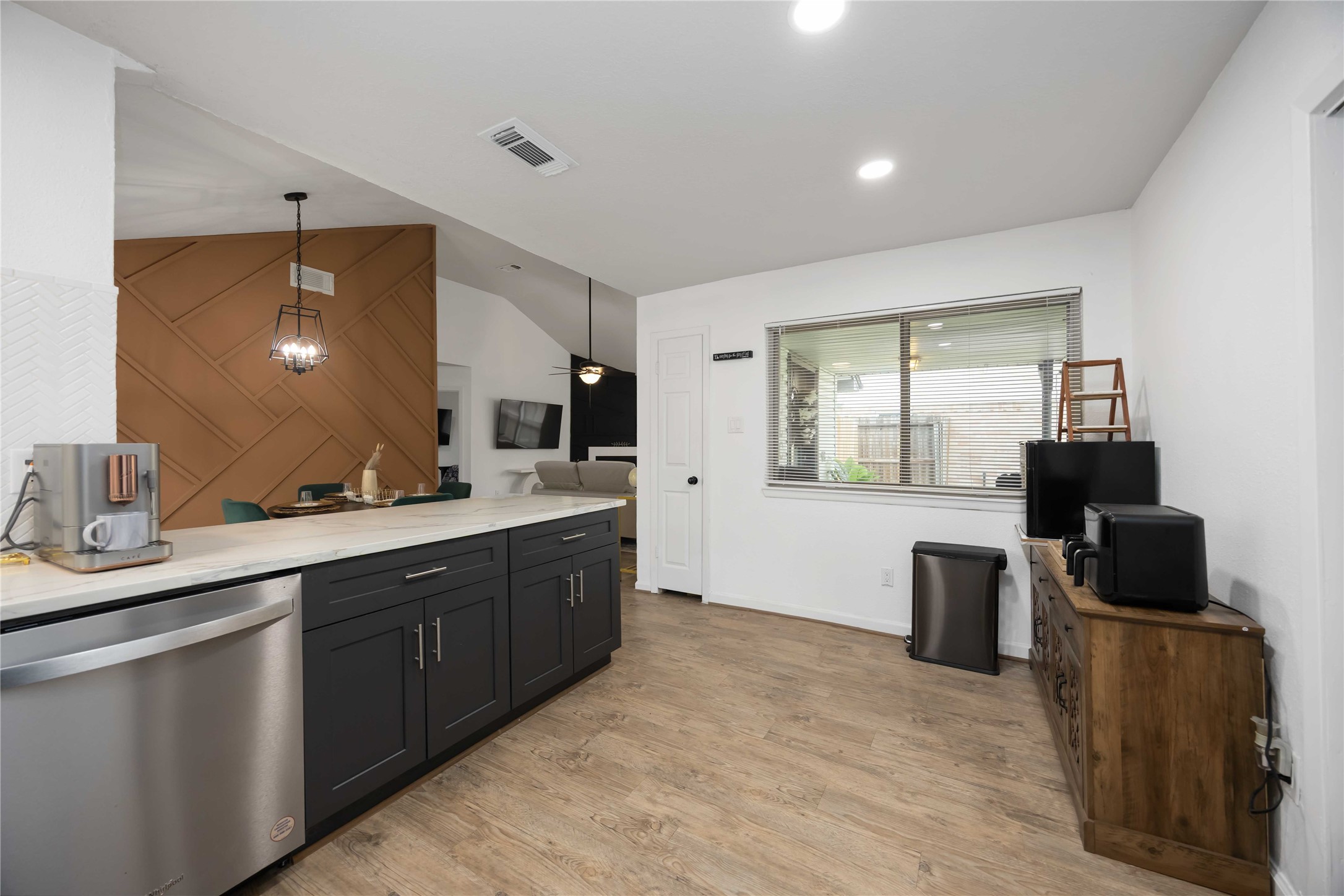 4811 Tealgate Drive Spring, TX 77373 - Photo 11 of 25 a large kitchen with stainless steel appliances kitchen island granite countertop a sink and cabinets