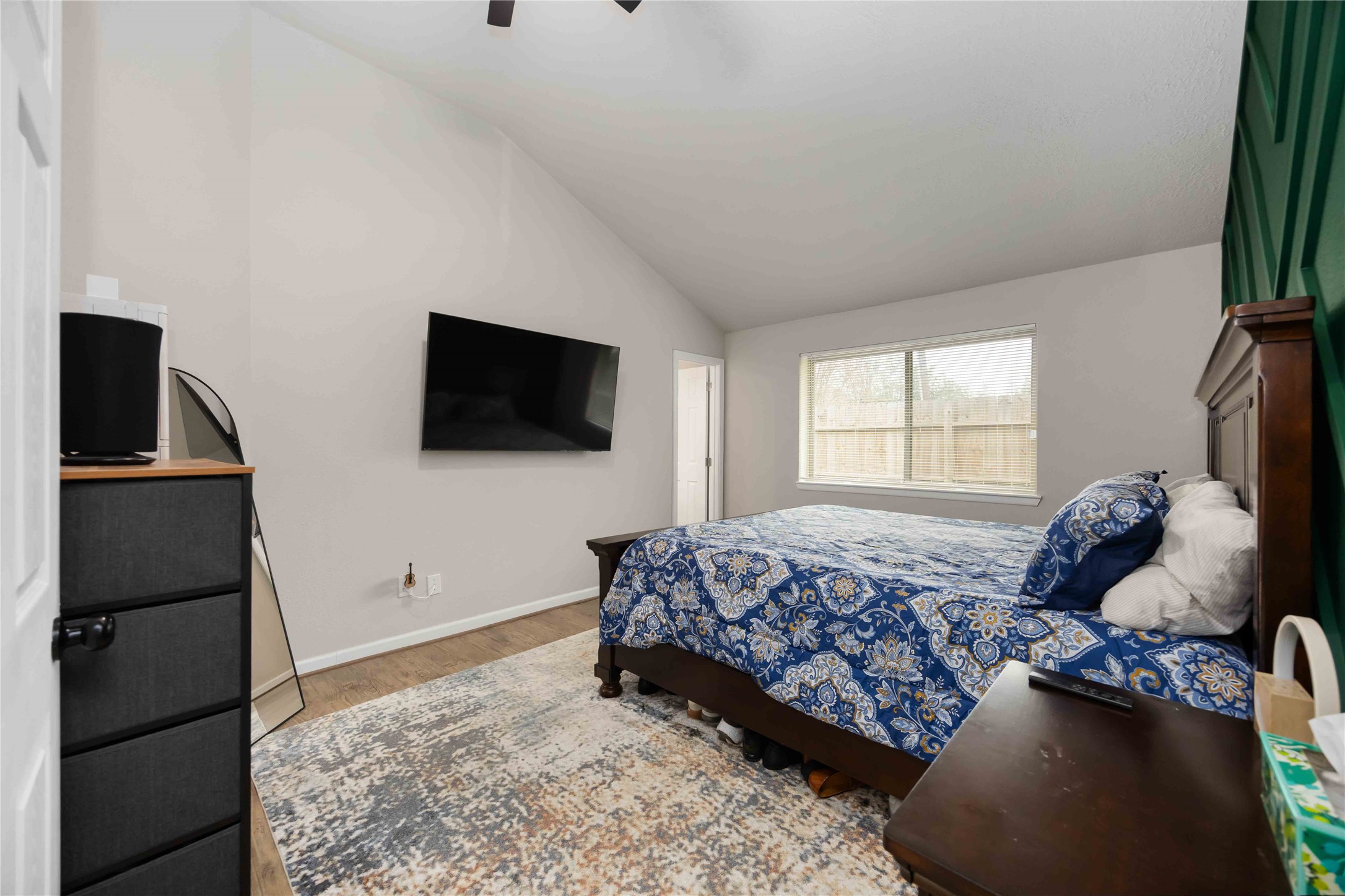 4811 Tealgate Drive Spring, TX 77373 - Photo 12 of 25 a living room with a bed furniture and a flat screen tv