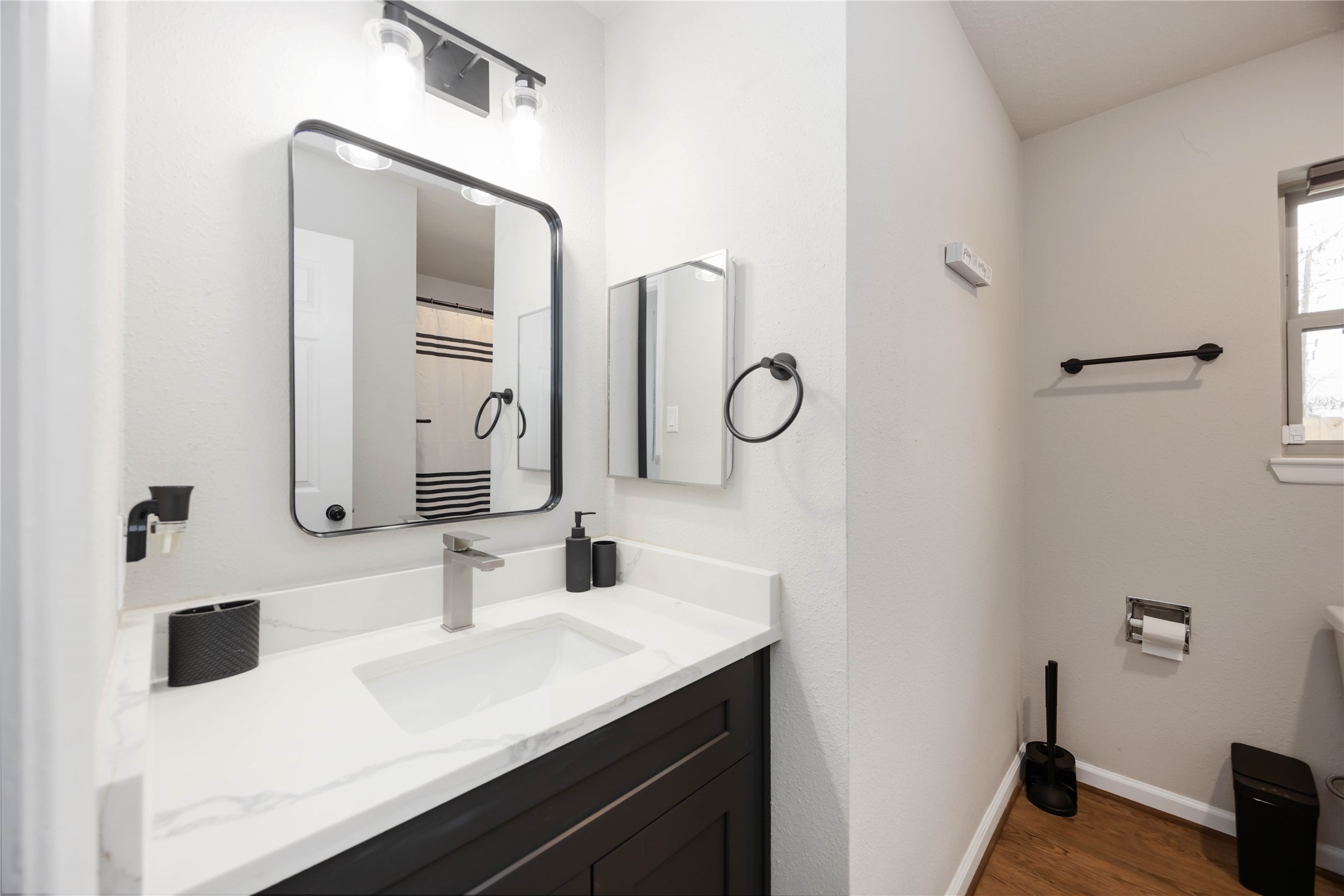 4811 Tealgate Drive Spring, TX 77373 - Photo 18 of 25 a bathroom with a sink vanity and mirror