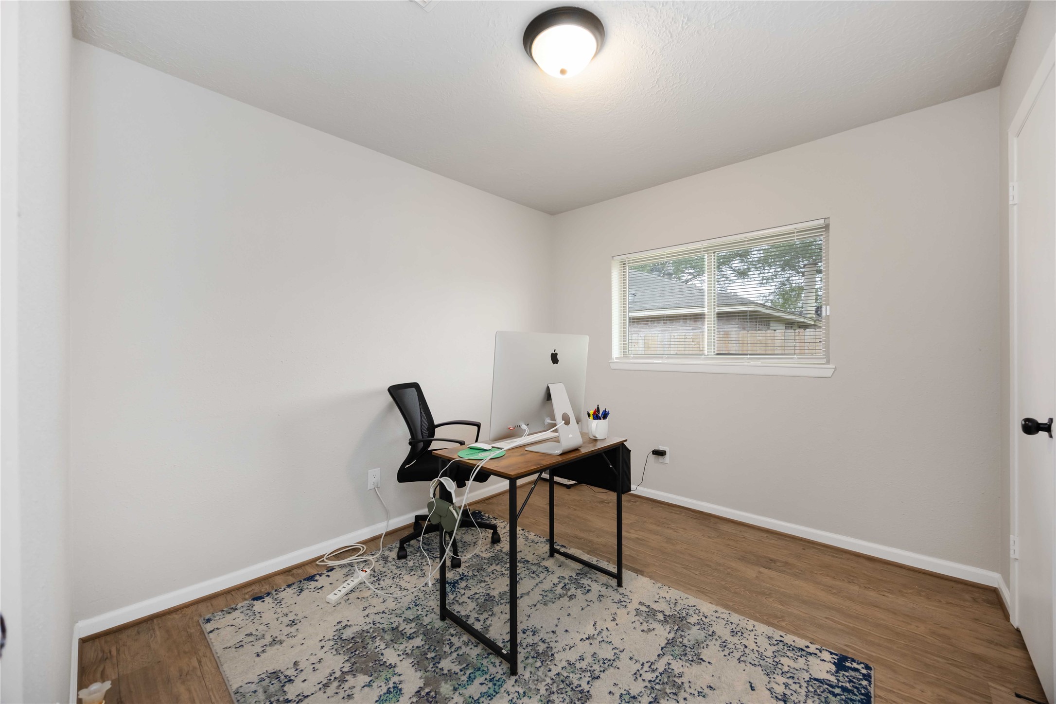 4811 Tealgate Drive Spring, TX 77373 - Photo 20 of 25 a workspace with furniture and wooden floor