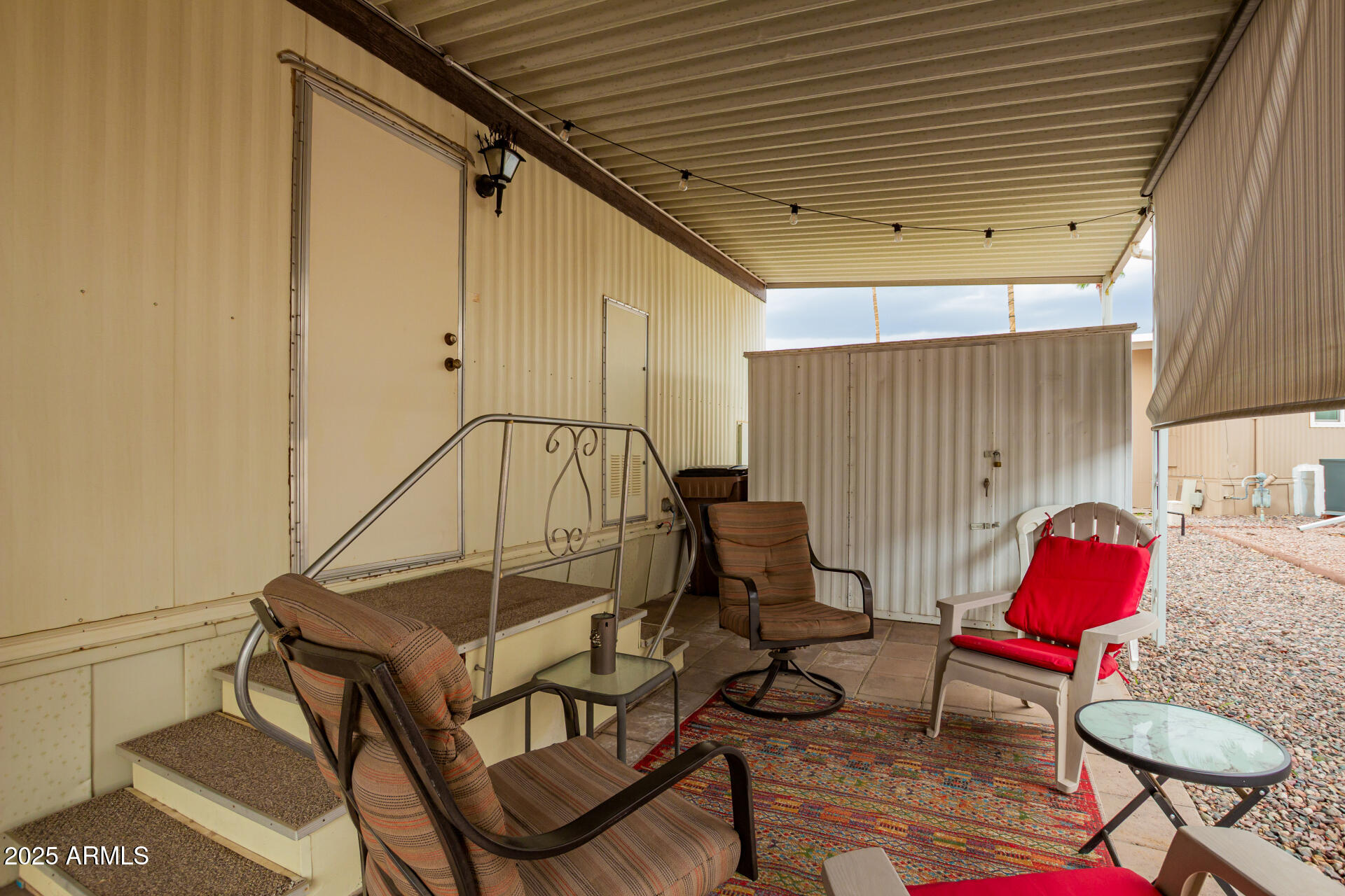 11425 East University Drive, Unit 53 Apache Junction, AZ 85120 - Photo 21 of 29 a room with furniture and a window