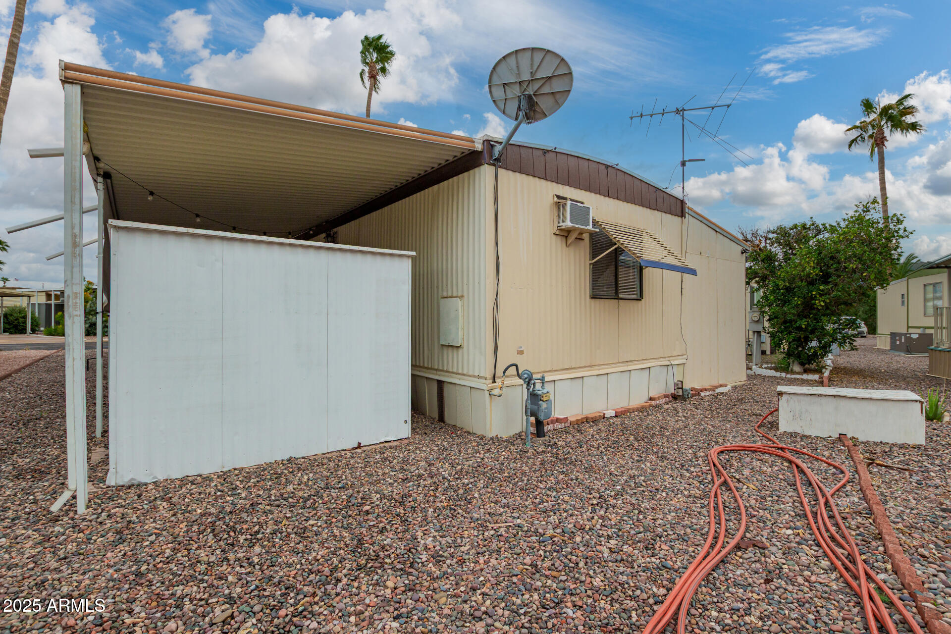 11425 East University Drive, Unit 53 Apache Junction, AZ 85120 - Photo 23 of 29 a view of a garage