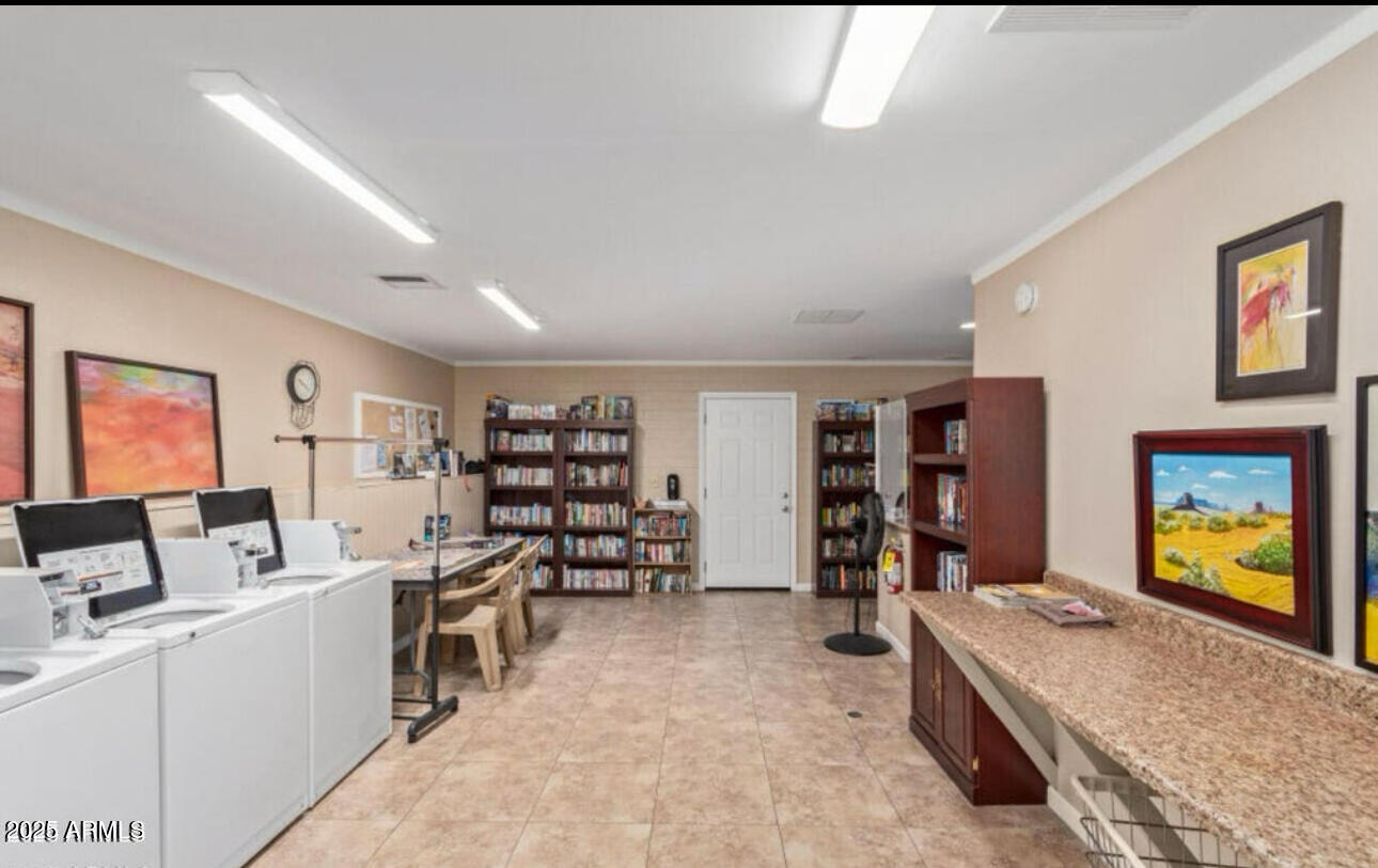 11425 East University Drive, Unit 53 Apache Junction, AZ 85120 - Photo 28 of 29 a living room with furniture and view of kitchen