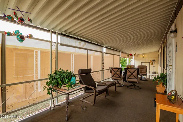 a view of a patio with chairs and tables