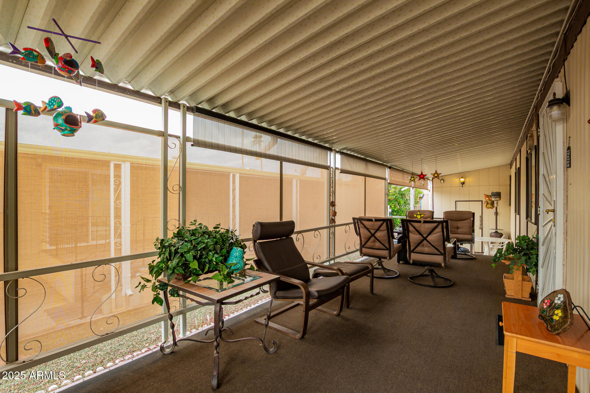 11425 East University Drive, Unit 53 Apache Junction, AZ 85120 - Photo 4 of 29 a living room with patio furniture