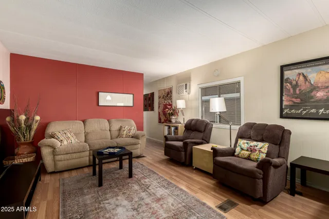 a kitchen with a table chairs stove and cabinets