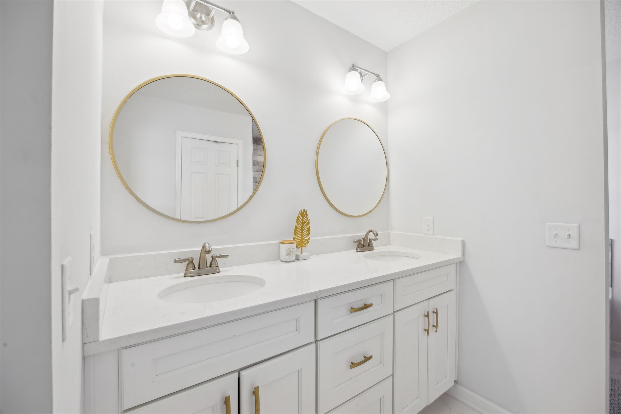 45480 Musslewhite Road Callahan, FL 32011 - Photo 18 of 31 a bathroom with a sink and a mirror