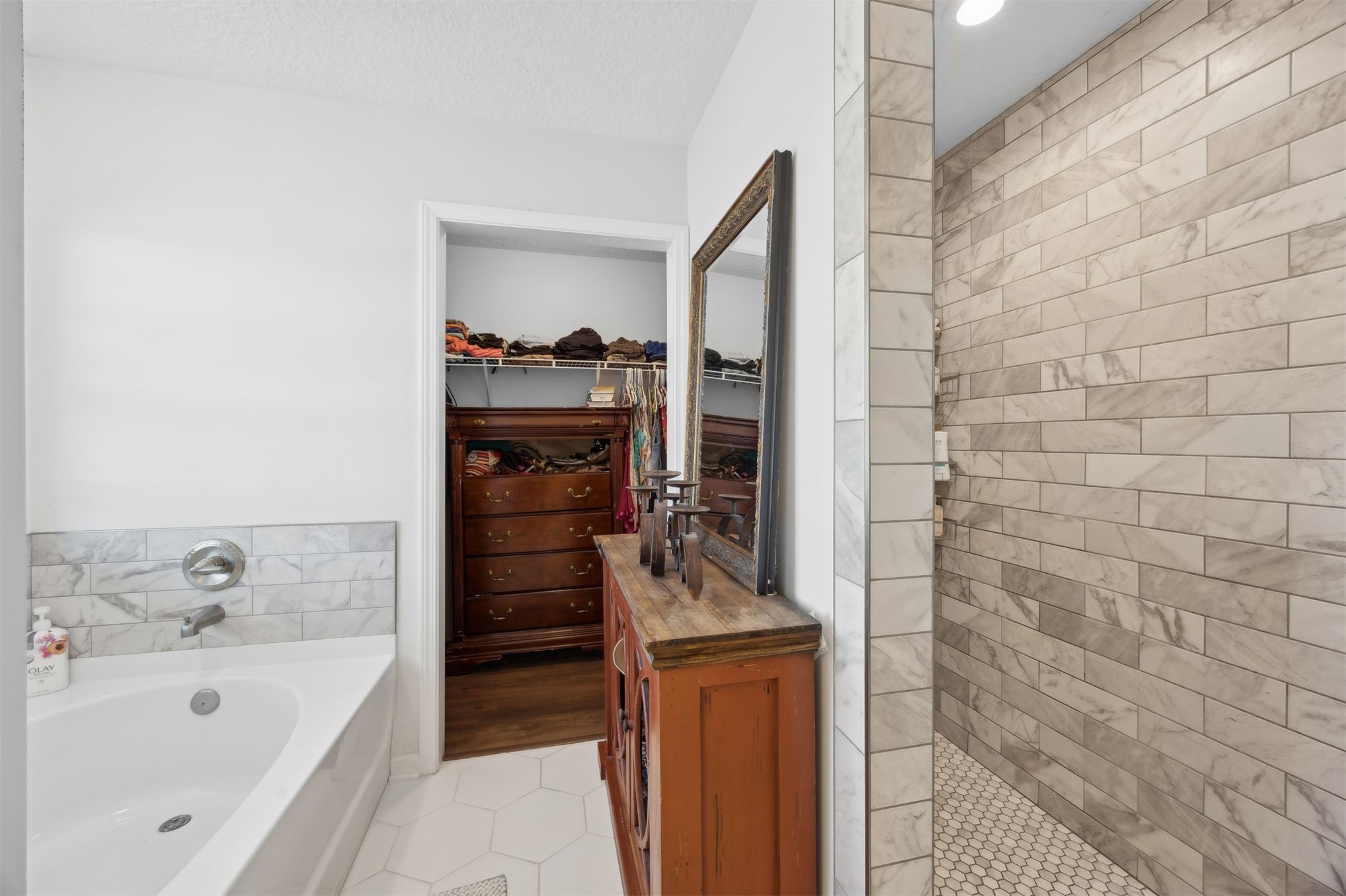 45480 Musslewhite Road Callahan, FL 32011 - Photo 19 of 31 a bathroom with a bathtub and a sink