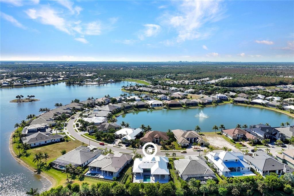 14286 Charthouse Circle Naples, FL 34114 - Photo 38 of 47 Aerial view of residential area featuring a nearby body of water