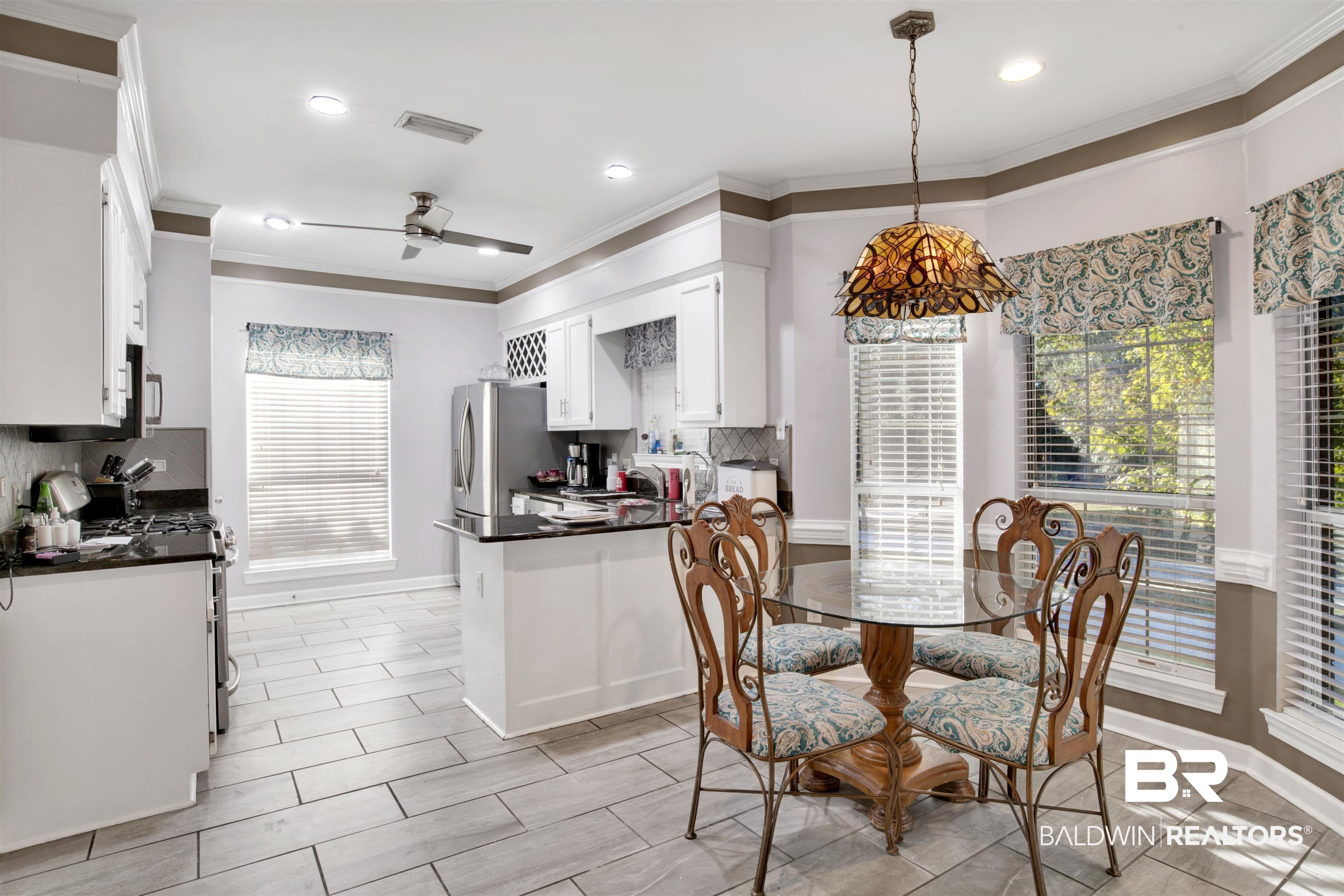 445 Wedgefield Drive South Mobile, AL 36608 - Photo 2 of 36 Dining area featuring ceiling fan and crown molding