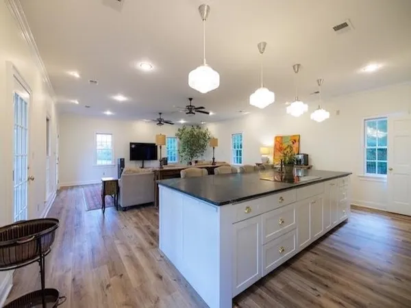 a living room with furniture and a rug