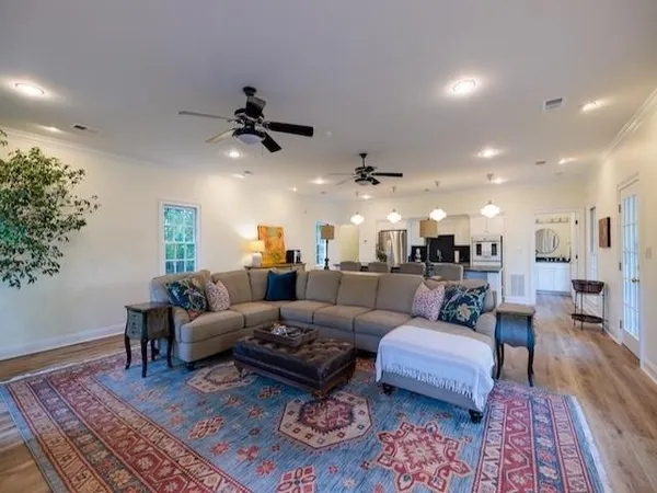 a room with furniture and pool table