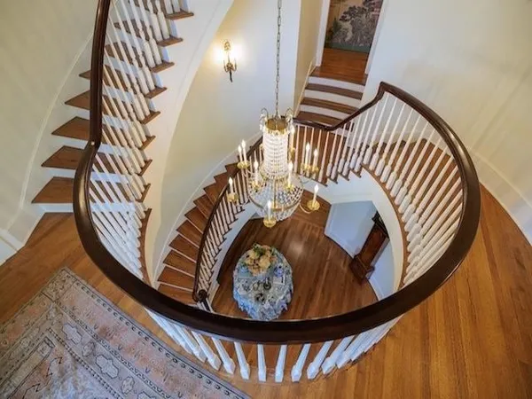 a view of a swimming pool with a balcony