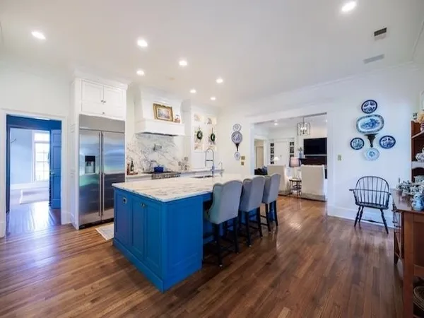 a view of a swimming pool with a yard