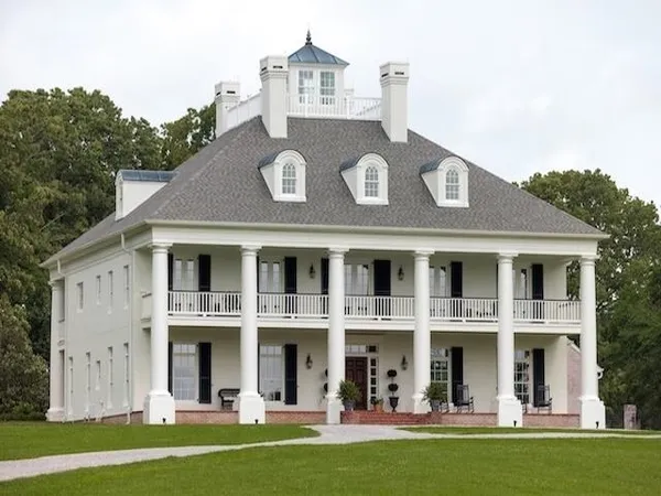 a view of a house with swimming pool and porch