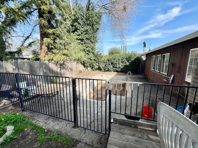 a view of balcony with wooden floor