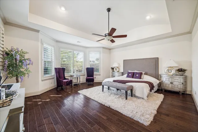 a bed room with bed and window