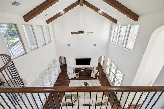 a view of living room with furniture and a window