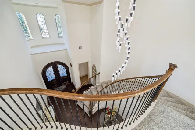 a view of a balcony with wooden floor