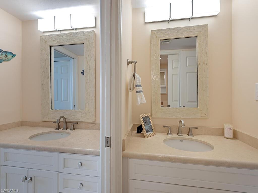 6849 Grenadier Boulevard, Unit 1803 Naples, FL 34108 - Photo 10 of 27 Guest Half Bath