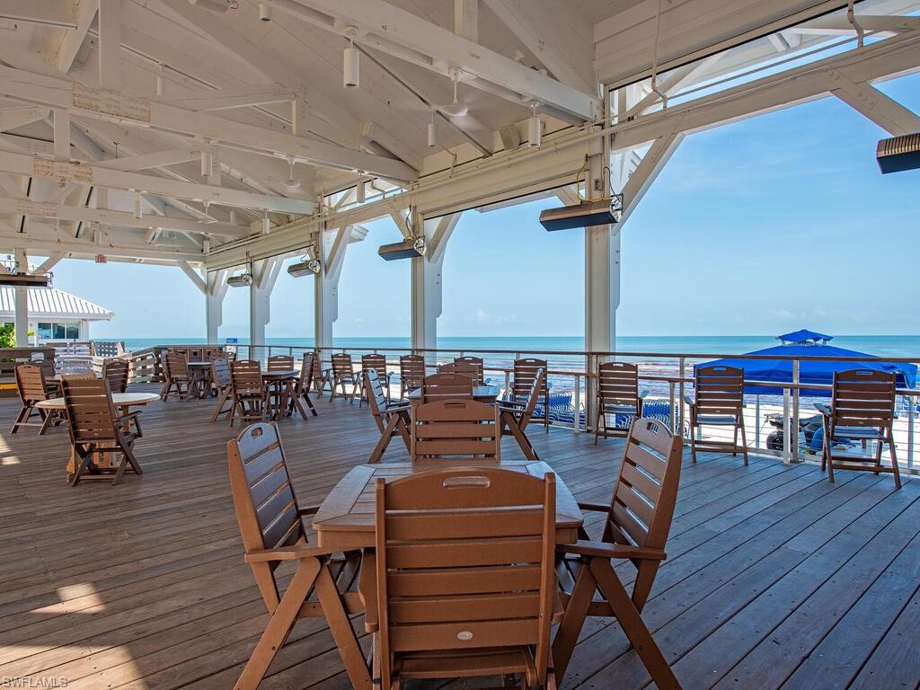 6849 Grenadier Boulevard, Unit 1803 Naples, FL 34108 - Photo 18 of 27 Sand Bar open air deck to relax and enjoy