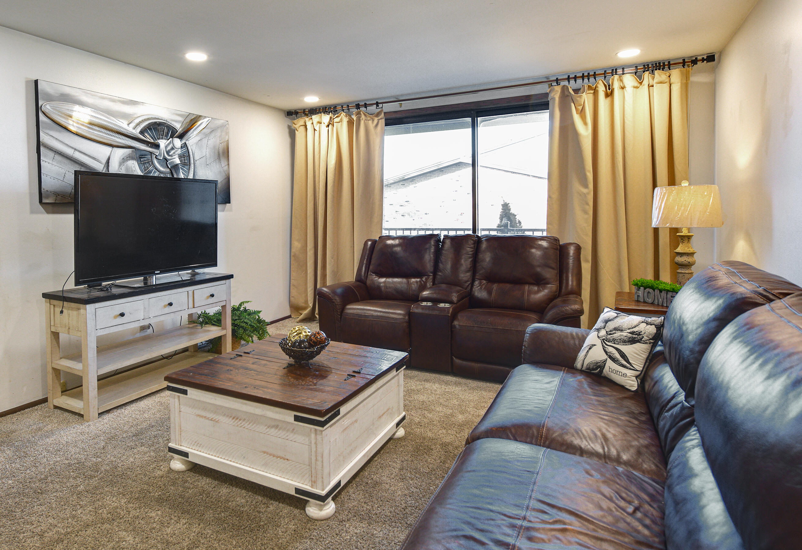 8735 North 72nd Street, Unit 204 Milwaukee, WI 53223 - Photo 8 of 14 Living room, new carpet.