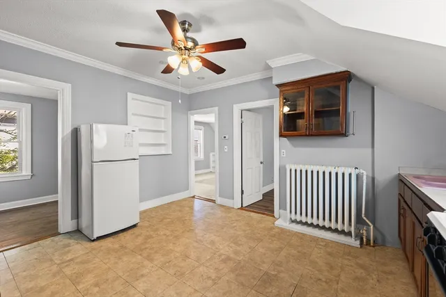 a view of a livingroom with a ceiling fan