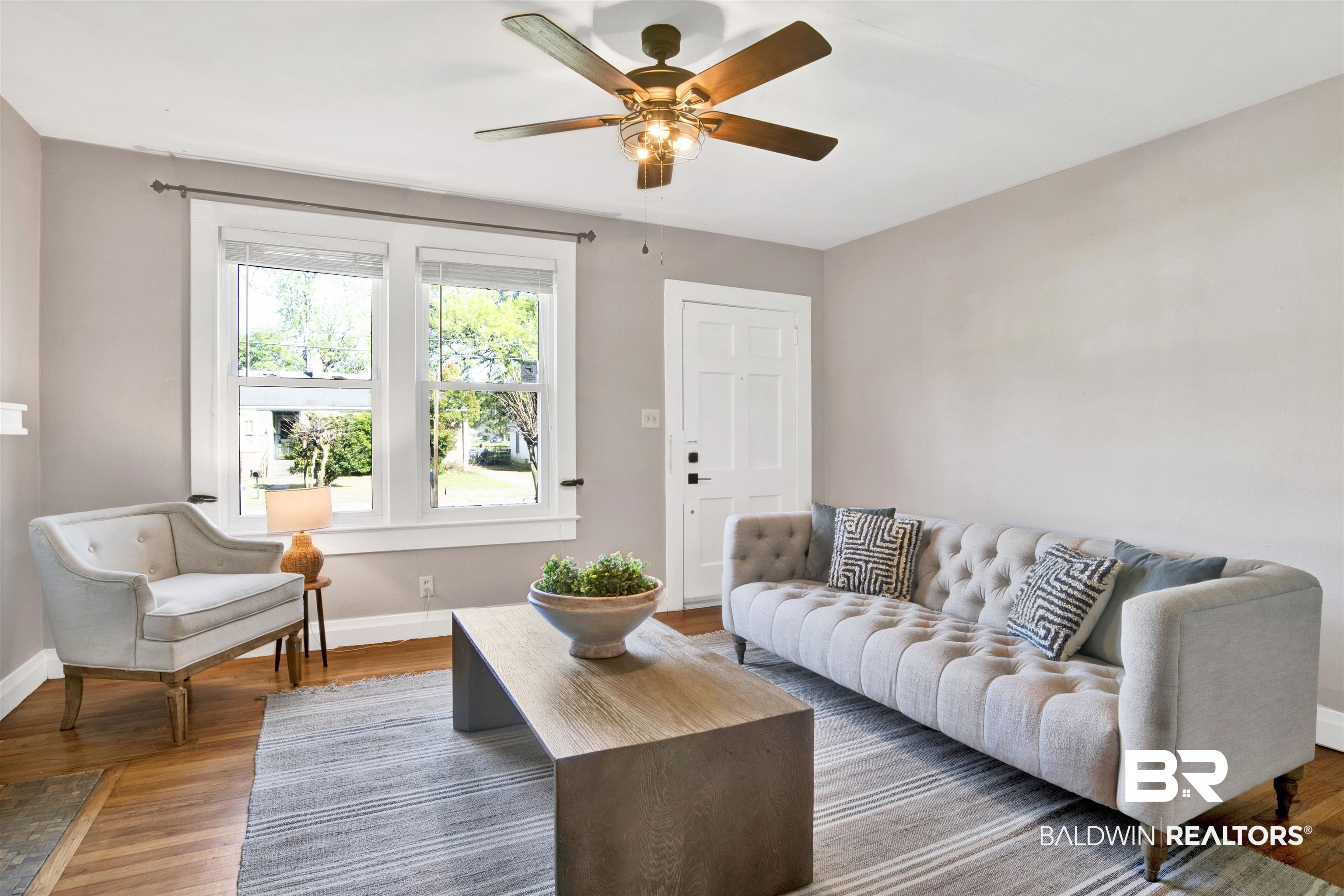 160 Emogene Place Mobile, AL 36606 - Photo 2 of 32 Living area with wood finished floors and a ceiling fan
