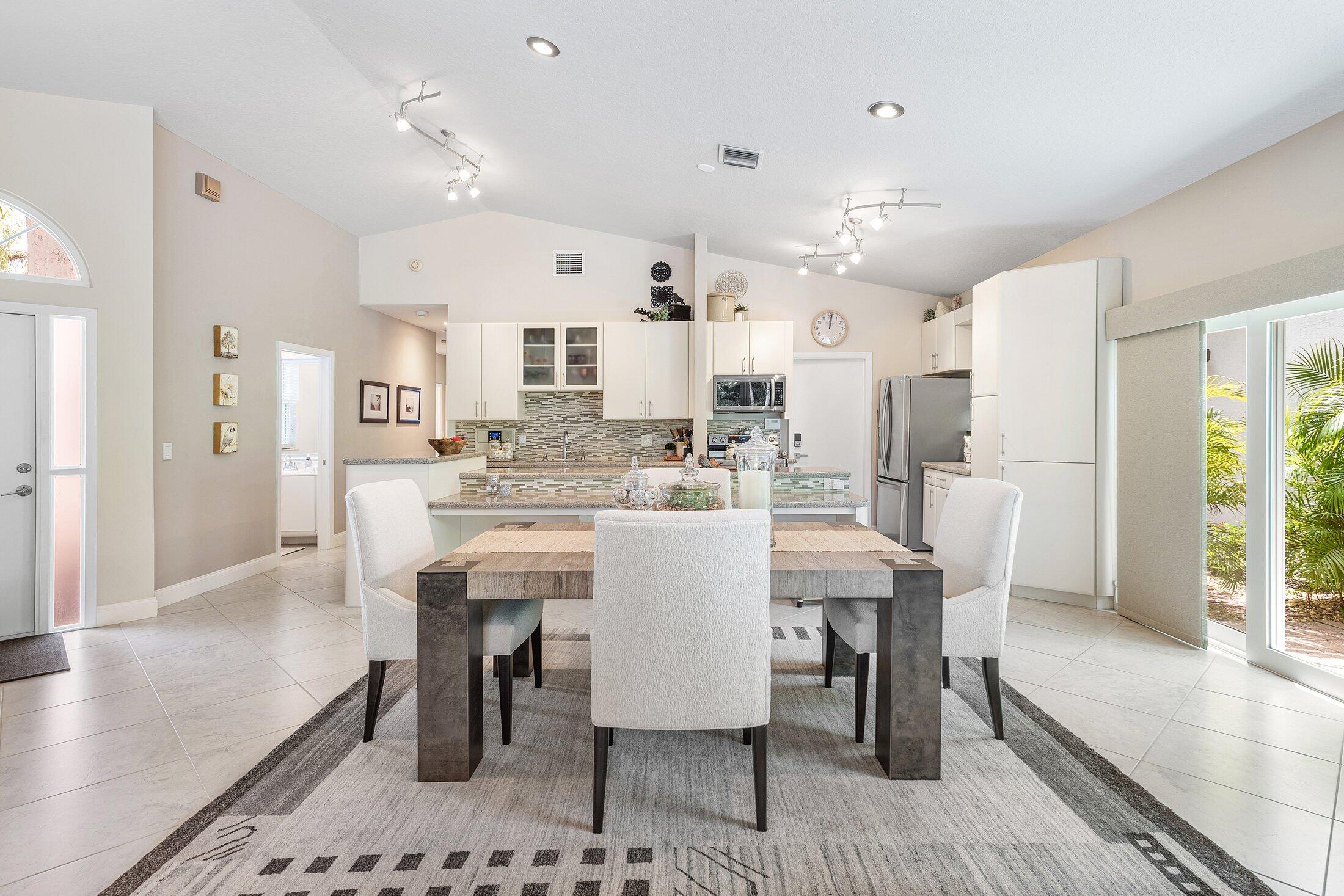 17275 Antigua Point Way Boca Raton, FL 33487 - Photo 12 of 64 Dining Room and Kitchen