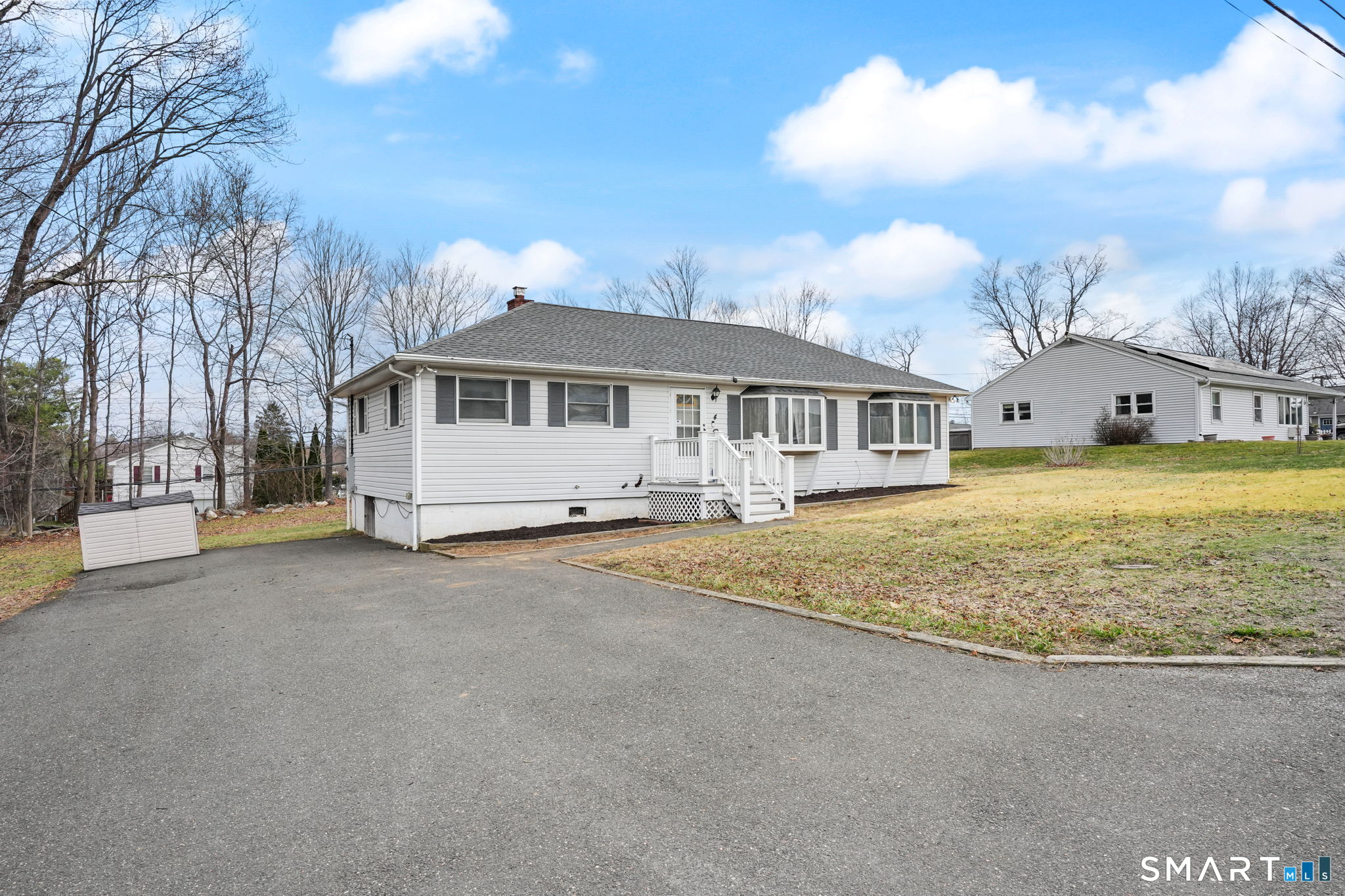 4 Wilson Street New Fairfield, CT 06812 - Photo 1 of 1 a view of a house with a yard and large tree