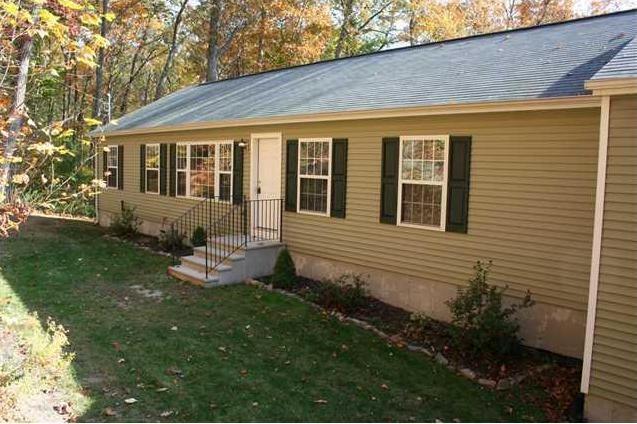20 Fanning Road Ledyard, CT 06339 - Photo 1 of 1 a front view of a house with garden