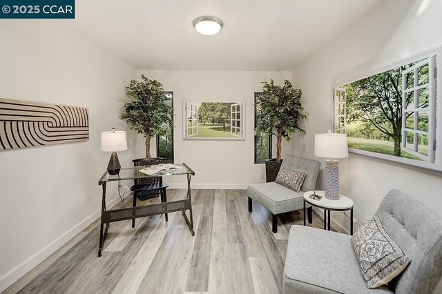a living room with furniture and a table