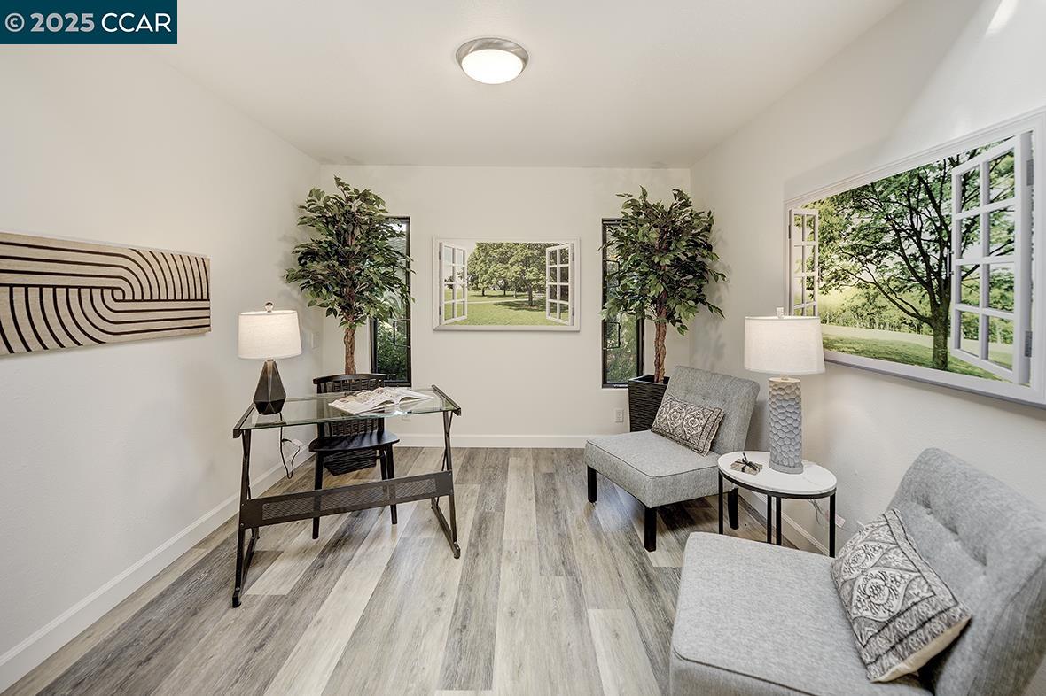 1315 Golden Rain Road, Unit 2 Walnut Creek, CA 94595 - Photo 12 of 54 a living room with furniture and a potted plant