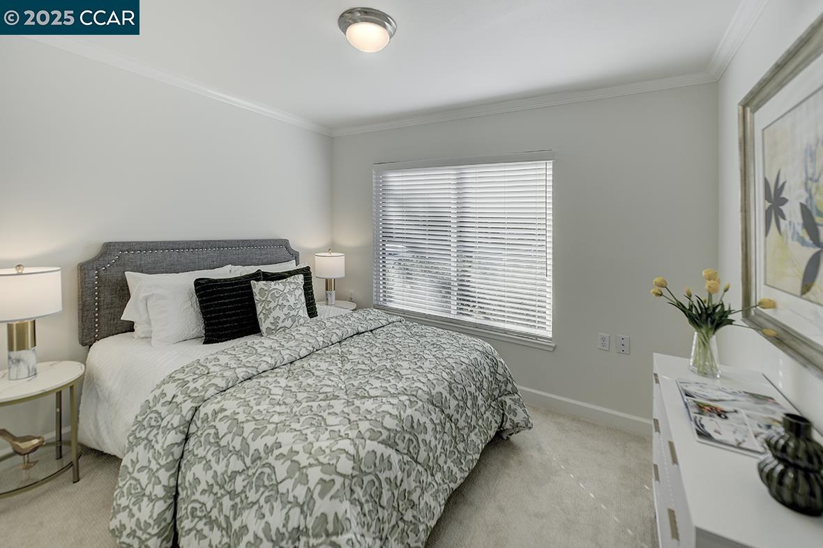 1315 Golden Rain Road, Unit 2 Walnut Creek, CA 94595 - Photo 23 of 54 a bedroom with a bed and a window