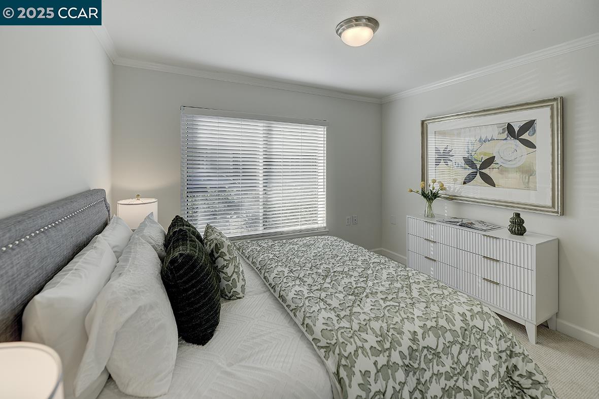 1315 Golden Rain Road, Unit 2 Walnut Creek, CA 94595 - Photo 24 of 54 a bed room with a bed and a window