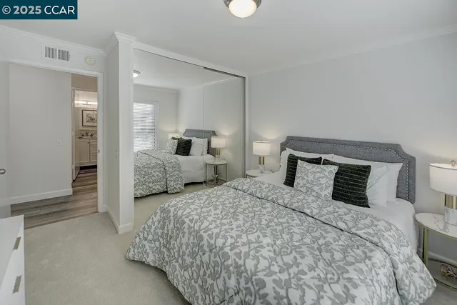 a bathroom with a sink toilet tub and shower