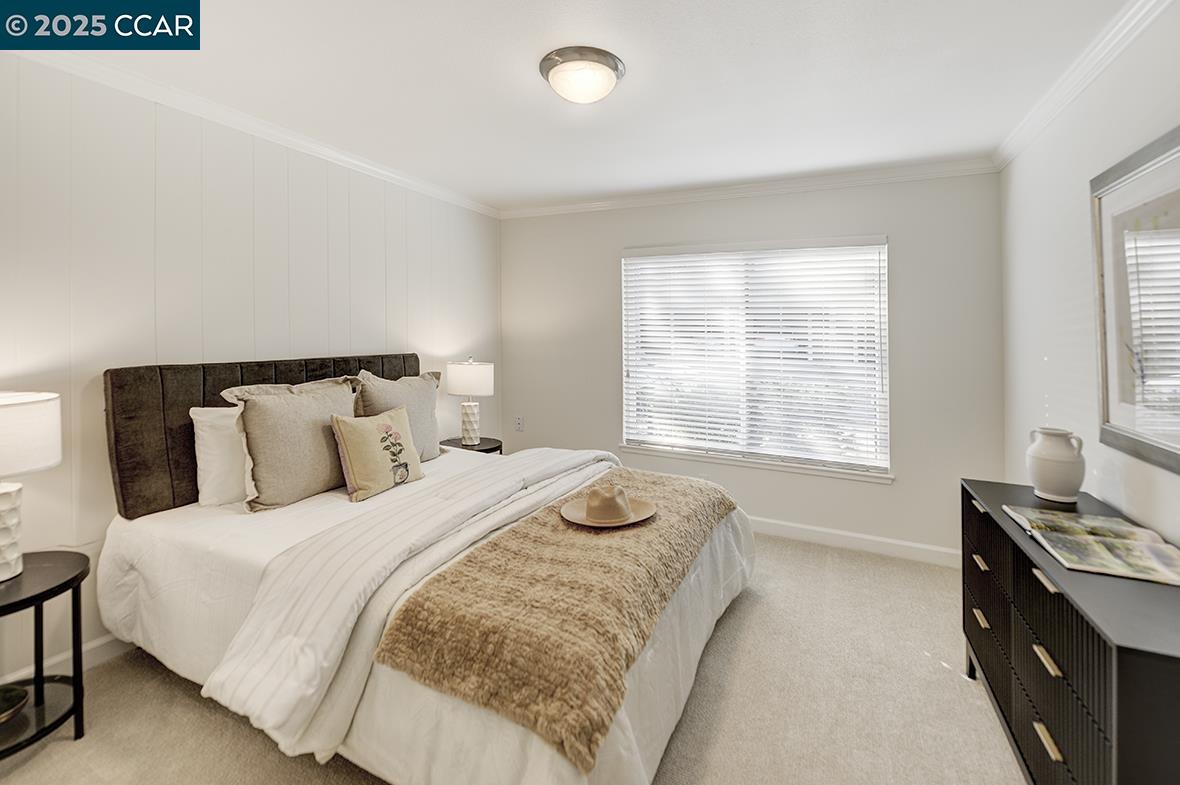 1315 Golden Rain Road, Unit 2 Walnut Creek, CA 94595 - Photo 30 of 54 a bedroom with bed and window