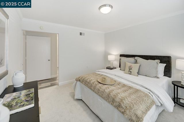 a bathroom with a sink shower and a mirror