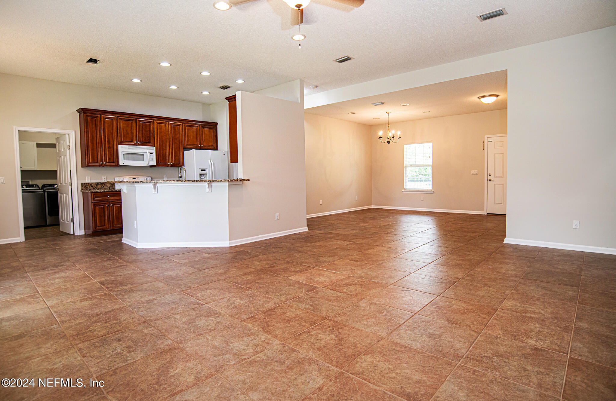 5285 Truman Pacetti Road St. Augustine, FL 32092 - Photo 6 of 31 Living to Kitchen & Dining area