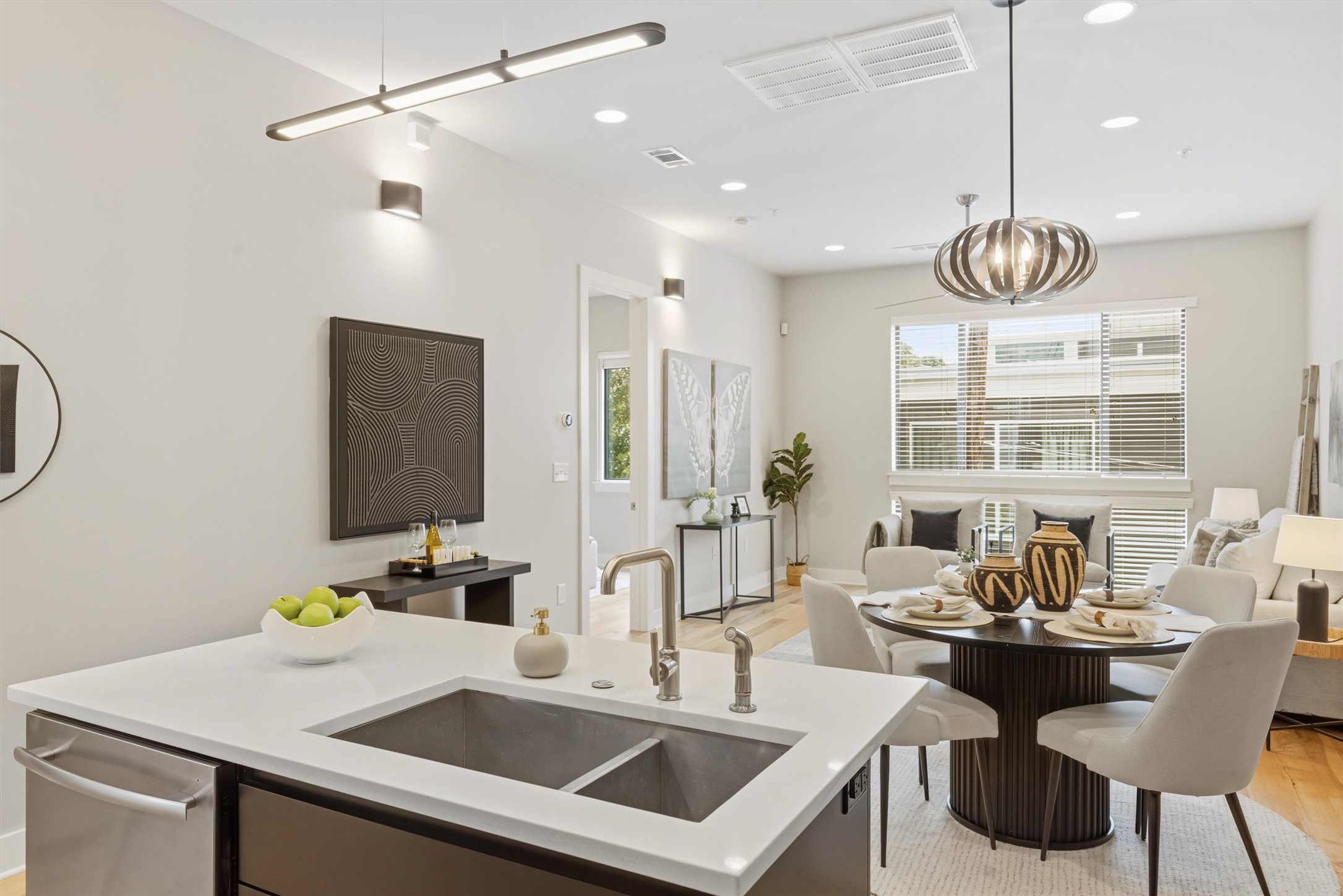 2314 Enfield Road, Unit 203 Austin, TX 78703 - Photo 7 of 37 Open sightlines from the kitchen to the living area make hosting effortless.