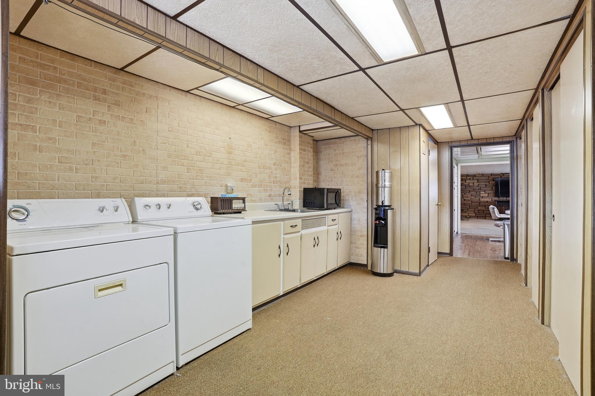 8931 Leonard Street Philadelphia, PA 19152 - Photo 35 of 52 a utility room with dryer and washer