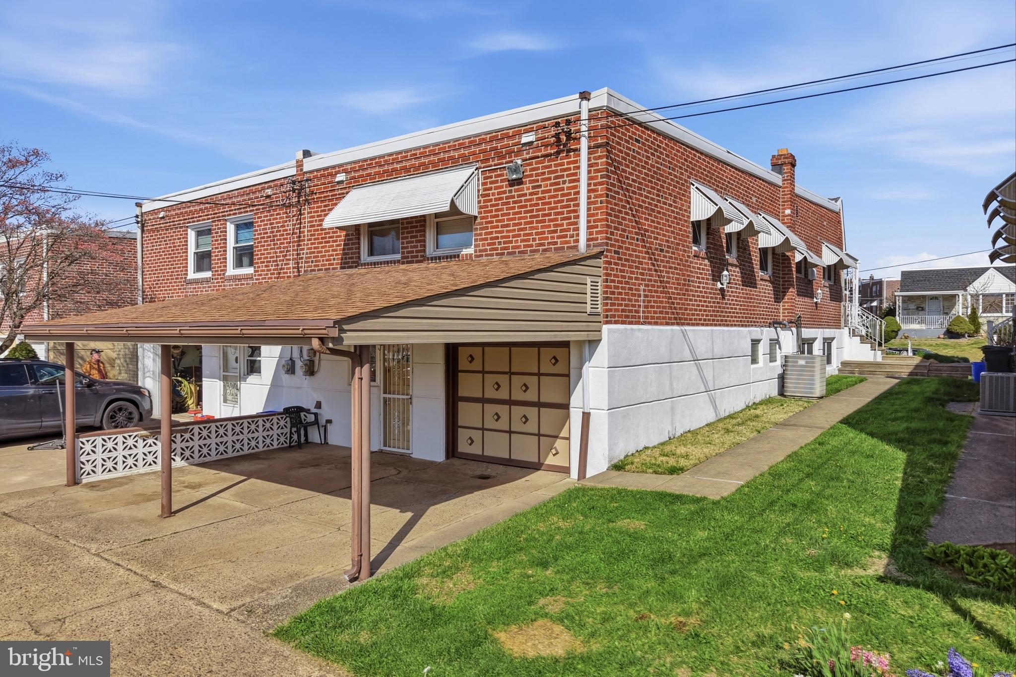 8931 Leonard Street Philadelphia, PA 19152 - Photo 45 of 52 a front view of a house with a yard