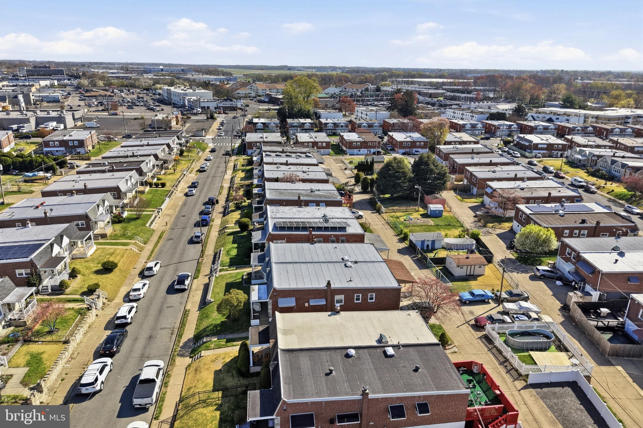 8931 Leonard Street Philadelphia, PA 19152 - Photo 51 of 52 an aerial view of a city with lots of residential buildings ocean and mountain view in back