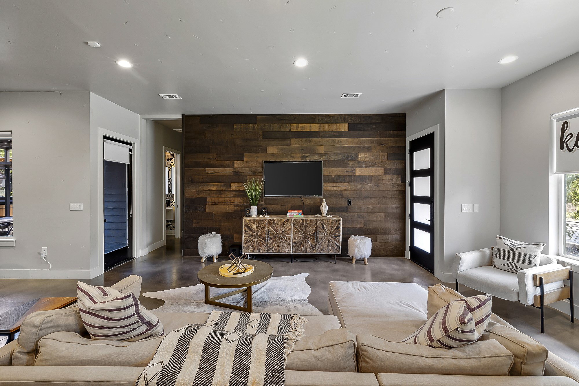 2414 Kinney Road Austin, TX 78704 - Photo 5 of 40 a living room with furniture and a fireplace