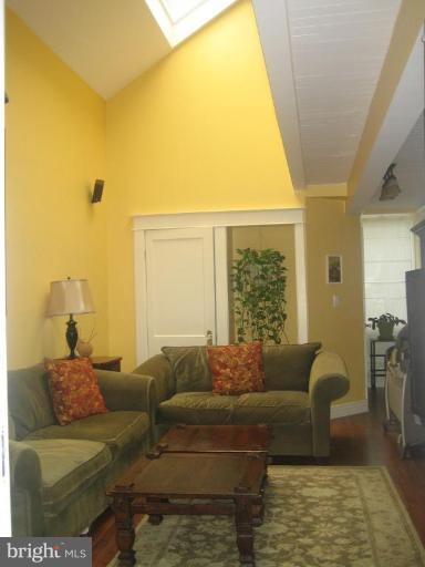 6401 Banbury Road Baltimore, MD 21239 - Photo 19 of 22 Family Room w/ Vaulted Ceilings & Skylights