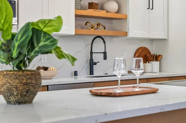 a bedroom with a bed and a chair