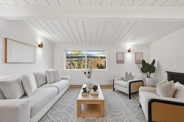 a bed room with a bed and a view of bedroom